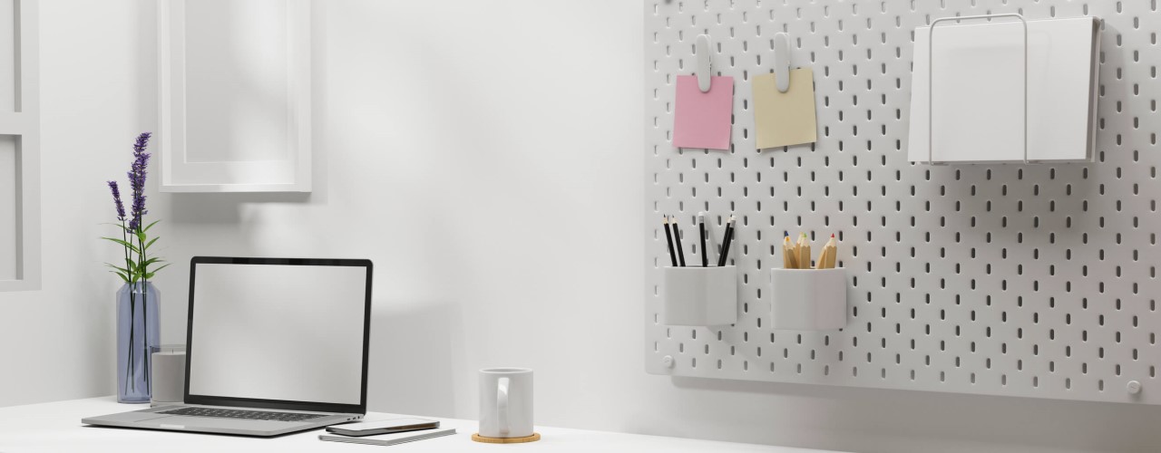 organised desk using pegboard hooks