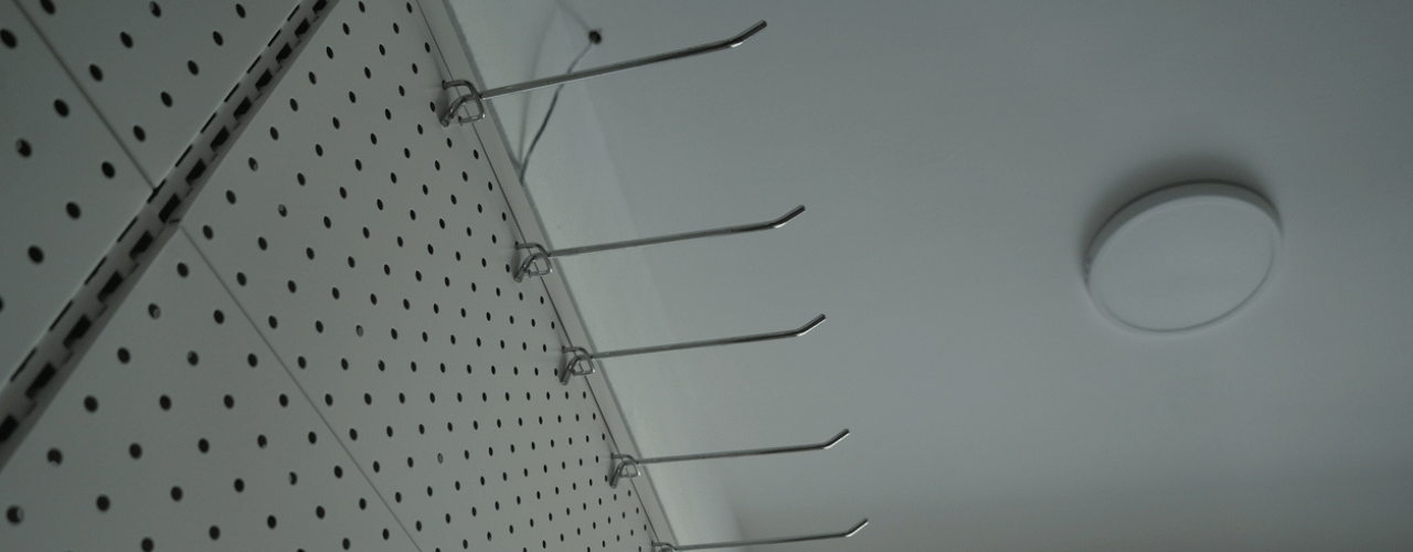 Retail display hooks in store