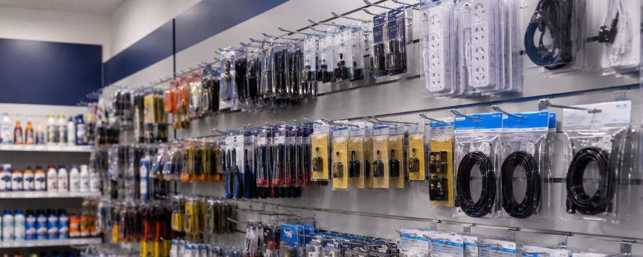 Retail display hooks showcasing neatly organised merchandise on a slatwall display system
